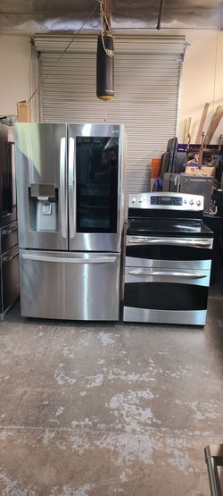 Refrigerator lg with fast Door,  Stove Electric And Microwave In Stainless Steel Combo Delevery