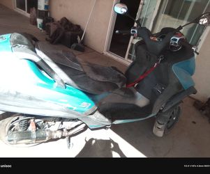 Teal Motor Scooter Moped