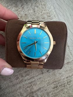 Michael Kors ladies slim runway gold blue dial watch