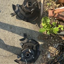 06-10 TOYOTA YARIS 1.5L FWD AT PASSENGER/ DRIVER SIDE FRONT SPINDLE KNUCKLE ASSEMBLY 