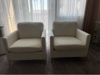 Two arm cream arm chairs