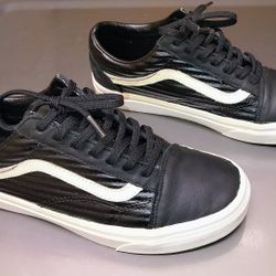 Classic Vans Old Skool in black leather with white stripe. Men’s 6 / Women’s 7.5. Rare.