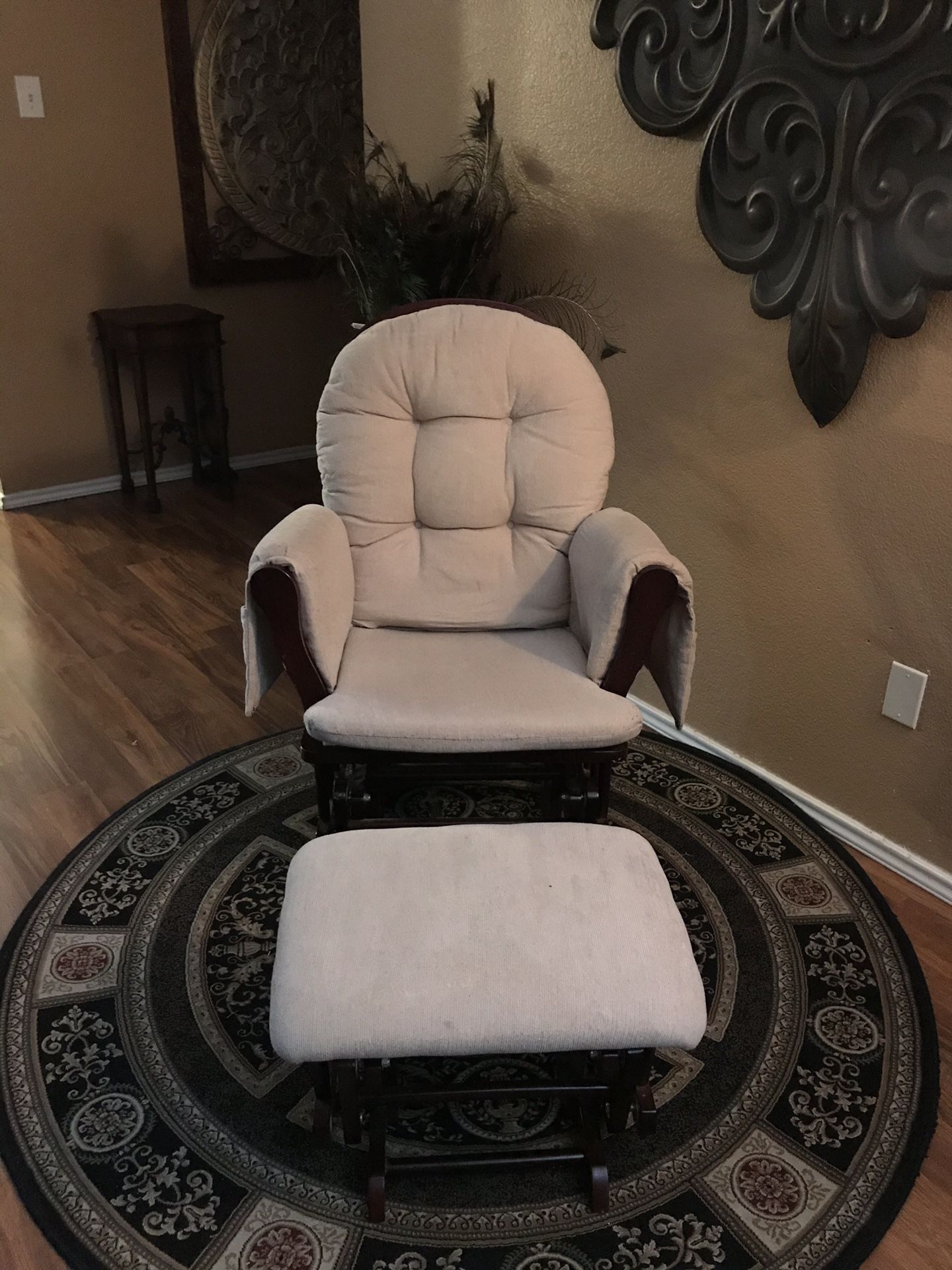 Super comfortable wood rocking chair with rocking ottoman.