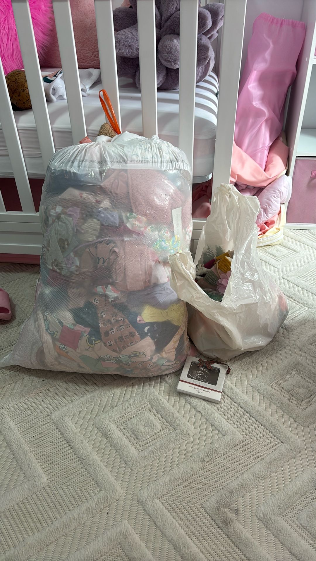 Bag Of Girls Clothes, Bows And Ornament