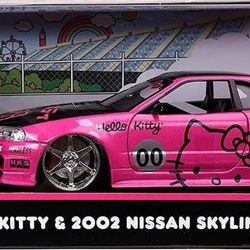 Jada Toys CHASE 1/24 2002 Nissan Skyline GT-R (BNR34) with Hello Kitty Figure