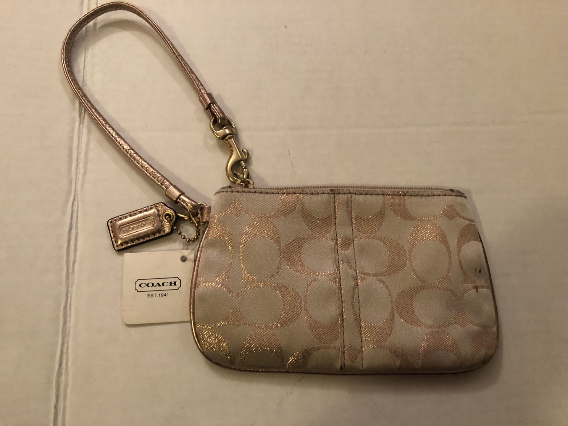 Coach rose gold Wristlet