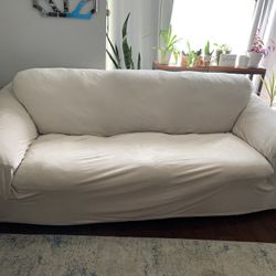 Leather Couch And Chair.  Glass Coffee Table