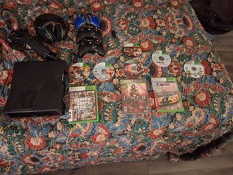 Xbox 360. It is black, like new with accessories.