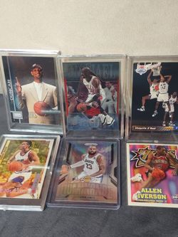 25 mixed basketball cards with rookies