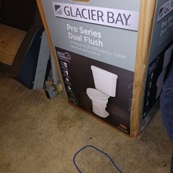 Brand New Glacier Bay Dual Flush Efficiency Toilet 