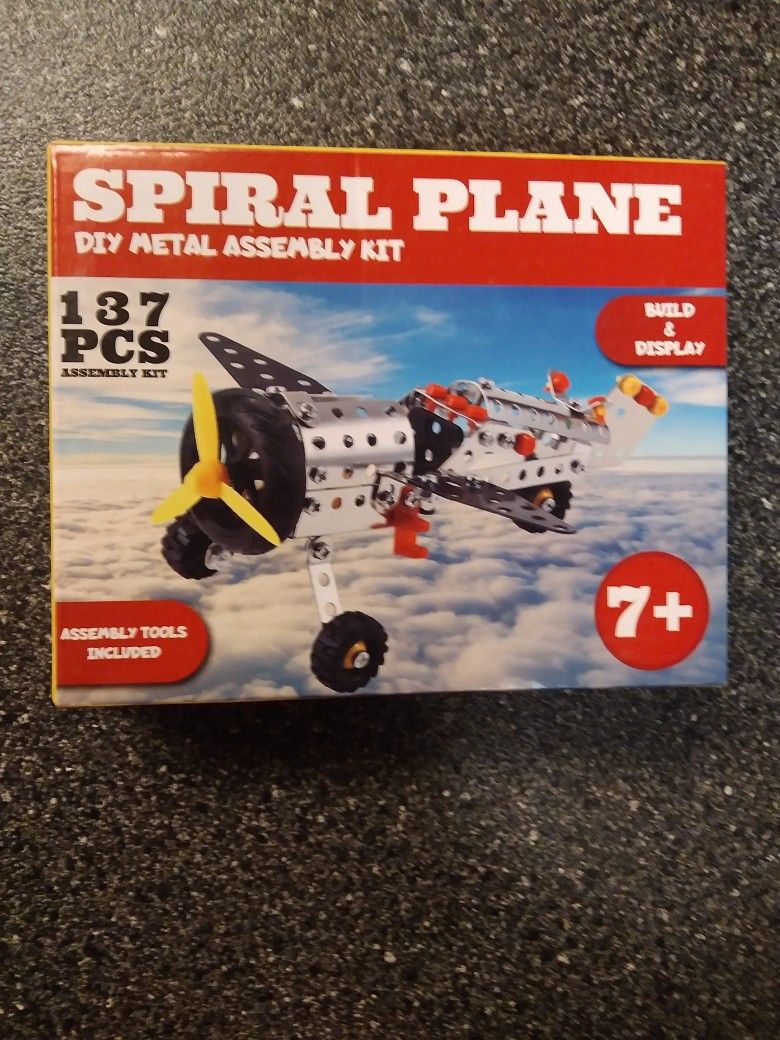 SPIRAL AIR PLANE. 137 PEICES. ALL TOOLS INCLUDED IN THE BOX. NEVER OPENED