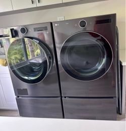 Washer, Dryer and 2 pedestals for storage