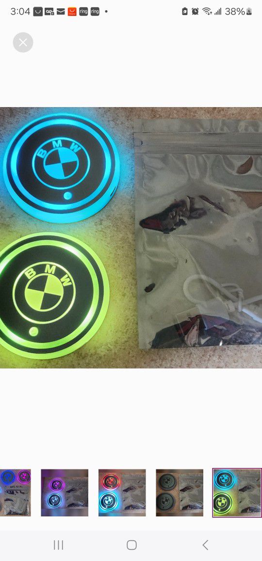 BMW, Lexus, Cadillac Or Mercedes Led Color Changing USB charged Car Cupholder Coasters.  Colors slowly fade from one color to the next. 