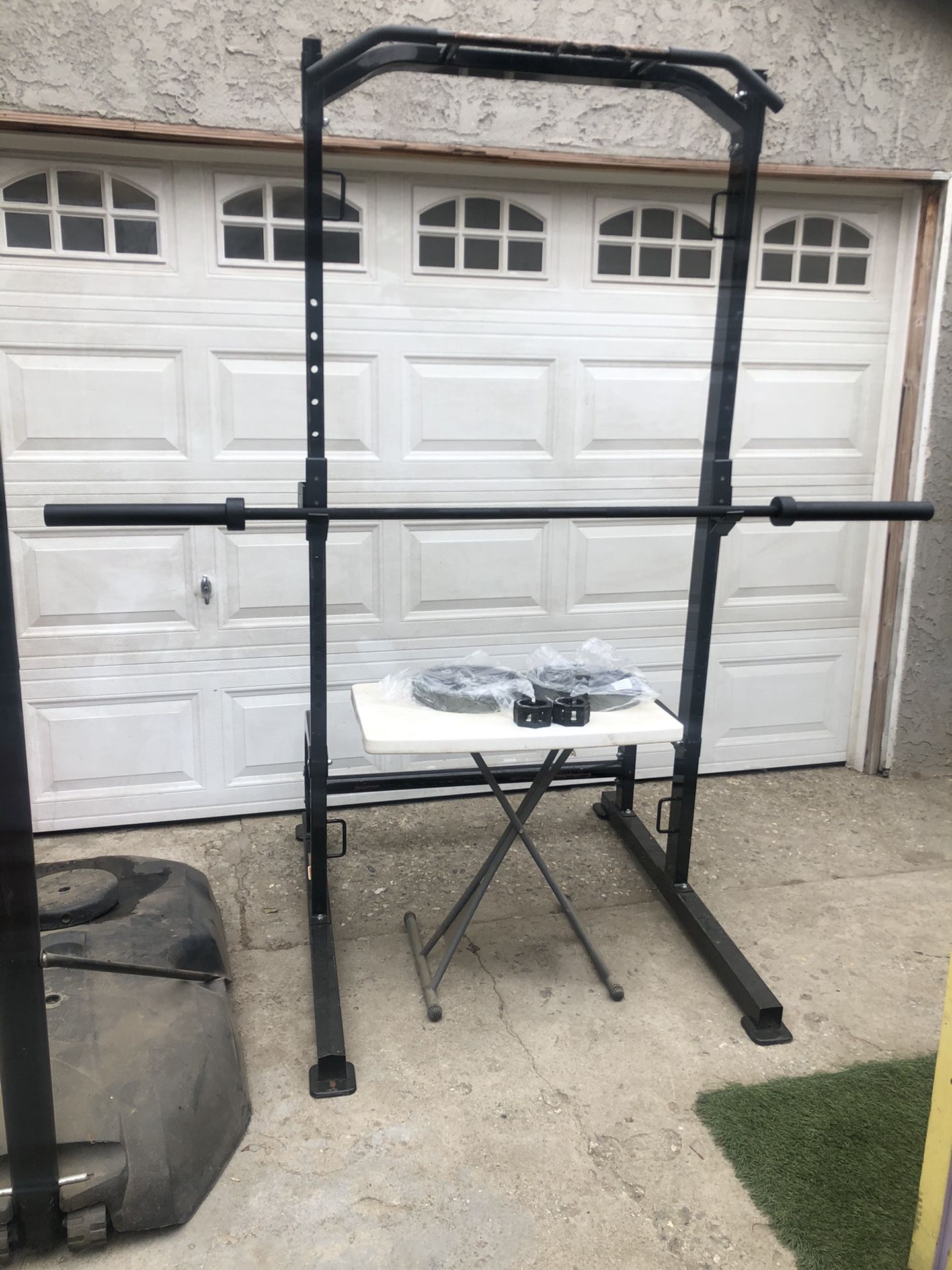 7ft Half Rack + 7 foot Barbell + 50 lbs new Olympic Weight