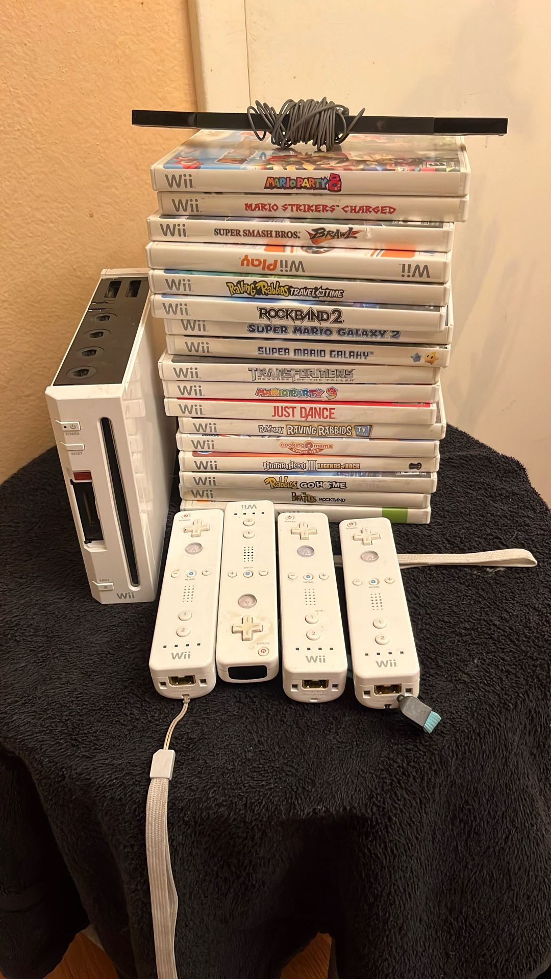 Wii Console, 4 Controllers, 17 Games, And Fitpad 