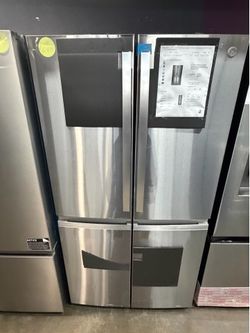 Ge profile 4 door refrigerator with ice and water duel dispenser
