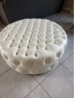Large tufted round ottoman