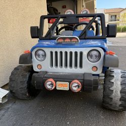 Fisher-Price Power Wheels Blue Jeep Wrangler