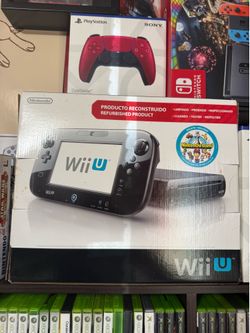 Wii u in box with games