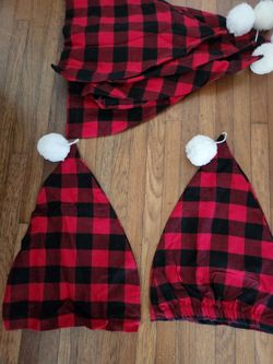 red & black checkered nightcap style holiday hat. 7 available.