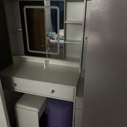 Touch screen sliding vanity with jewelry storage