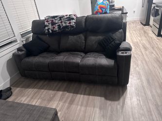 Dark Gray Reclining Loveseat with Cup Holders