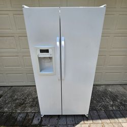 Clean White GE Side By Side Refrigerator 