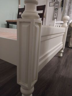 real wood bed frame, cream color, twin size XL. Only interested parties please.