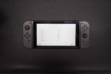 Nintendo Switch with Gray Joy-Con Controllers