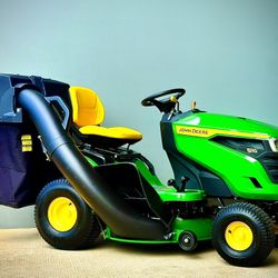 Brand new John Deere S110 42-in 19 - HP Single cylinder Gas Riding lawn mower comes with John Deere Bagger. 