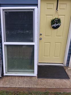 Two vinyl siding windows 3x5