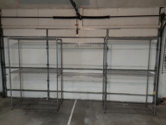 Chrome heavy-duty shelving units.