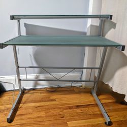 Dual level glass computer desk with metal frame