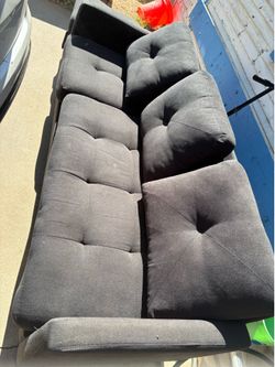It’s a light gray couch.