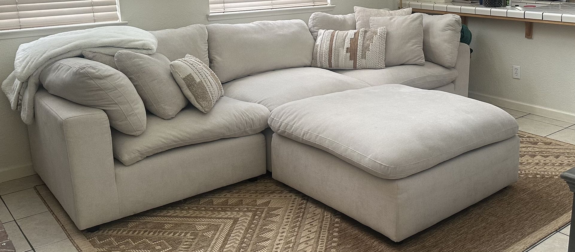 Living Spaces Couch with a Separate Ottoman