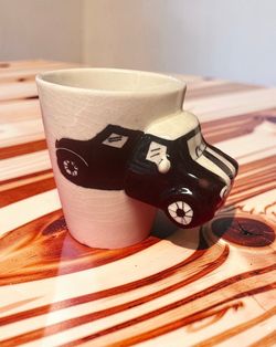 3D coffee mug car hood handle, Thailand. Mini Cooper?