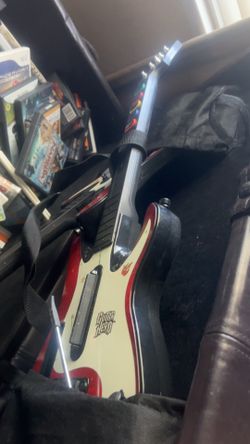 2 Rockband Wii guitar controllers