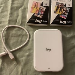 New Canon Ivy Photo Printer My ultimate favorite in perfect condition with 20 pictures