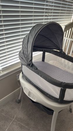 Graco Electric Rocking bassinet.