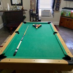 7ft Pool Table Includes Name brand Pool stick ,triangle With All Balls And Chalk In Great Condition Must Pick Up Can Not Deliver
