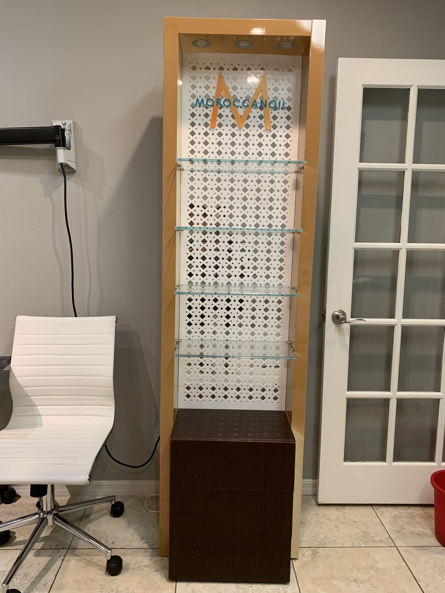 Moroccan Oil lighted display cabinet w/storage drawer