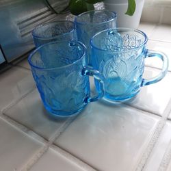 4 Vtg. Fruit pattern Embossed Blue Glass KIG mugs