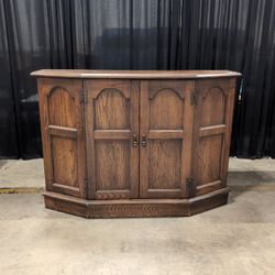 Dark Wood Corner Cabinet with Arched Panels
