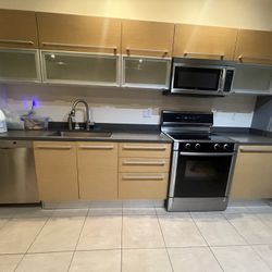 Used Cabinets and Caesarstone Countertops