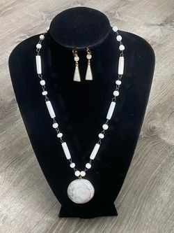 CALENDAR MEDALLION NECKLACE