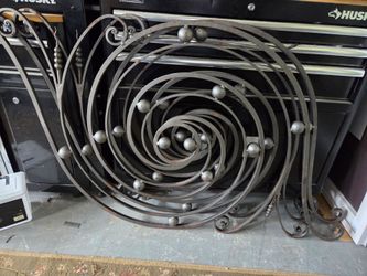 Forge steel panel scrolls