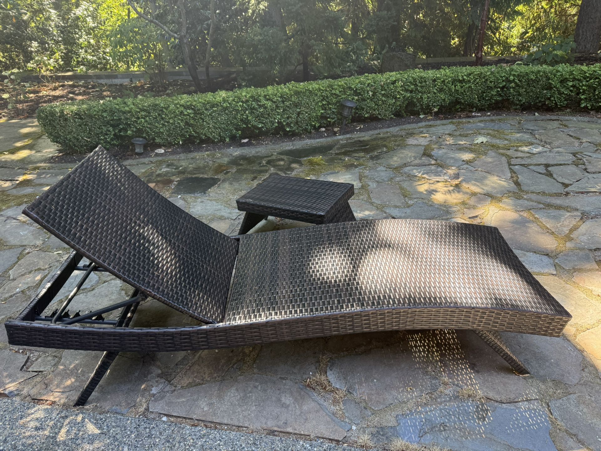 Two Weather Resistant Woven Lounge Chairs