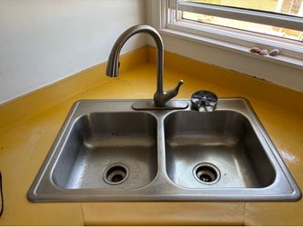 Sink with kohler faucet