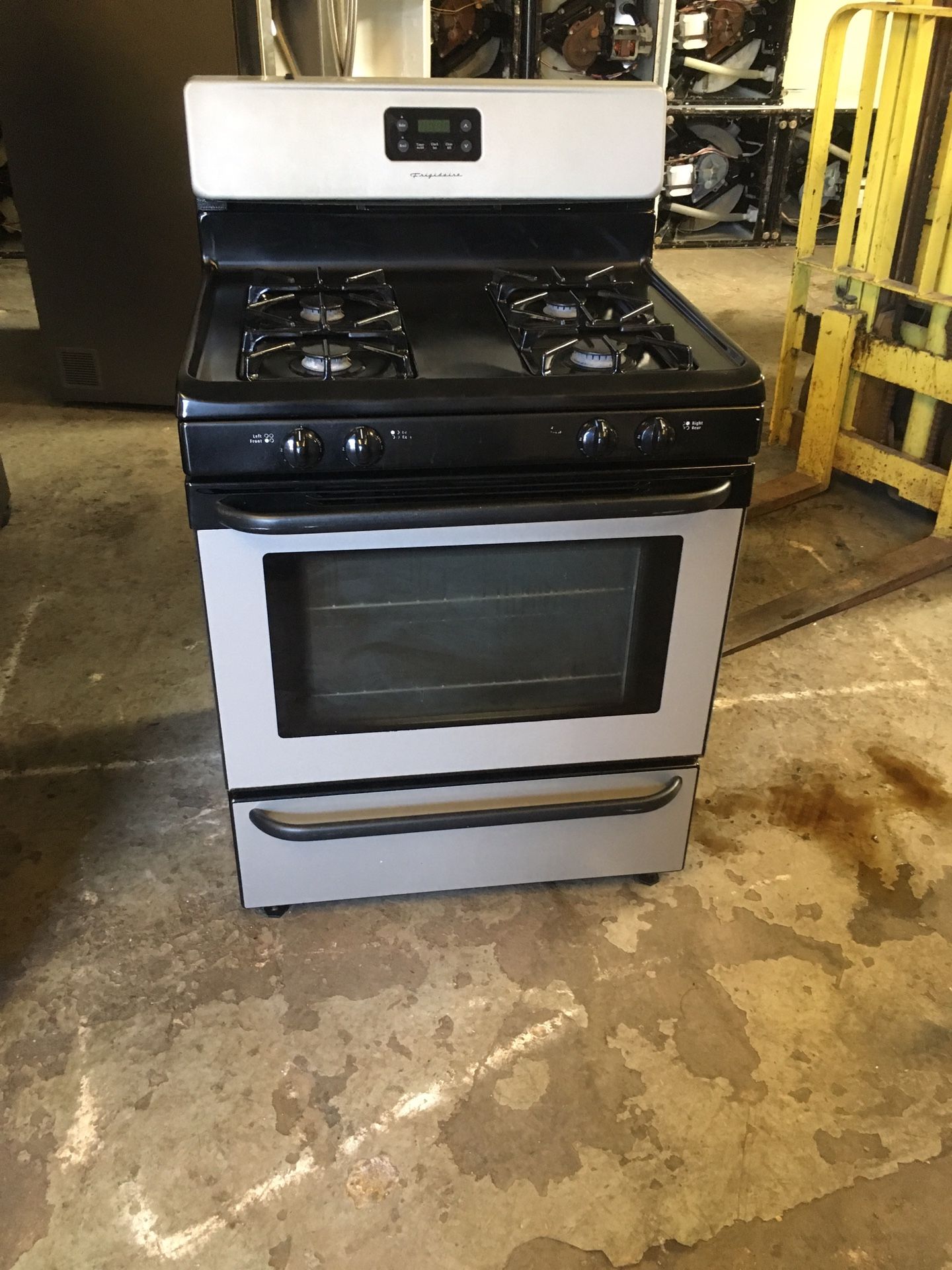 Stove gas brand Frigidaire everything is good working condition 90 days warranty delivery and installation