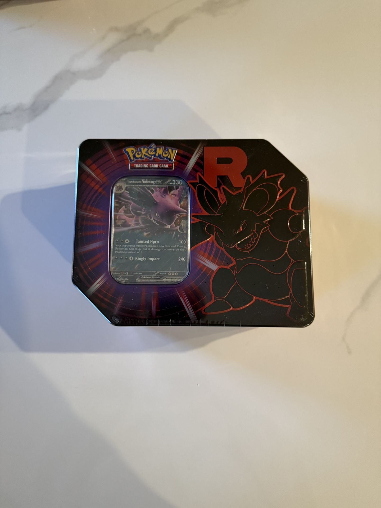 team rocket tin